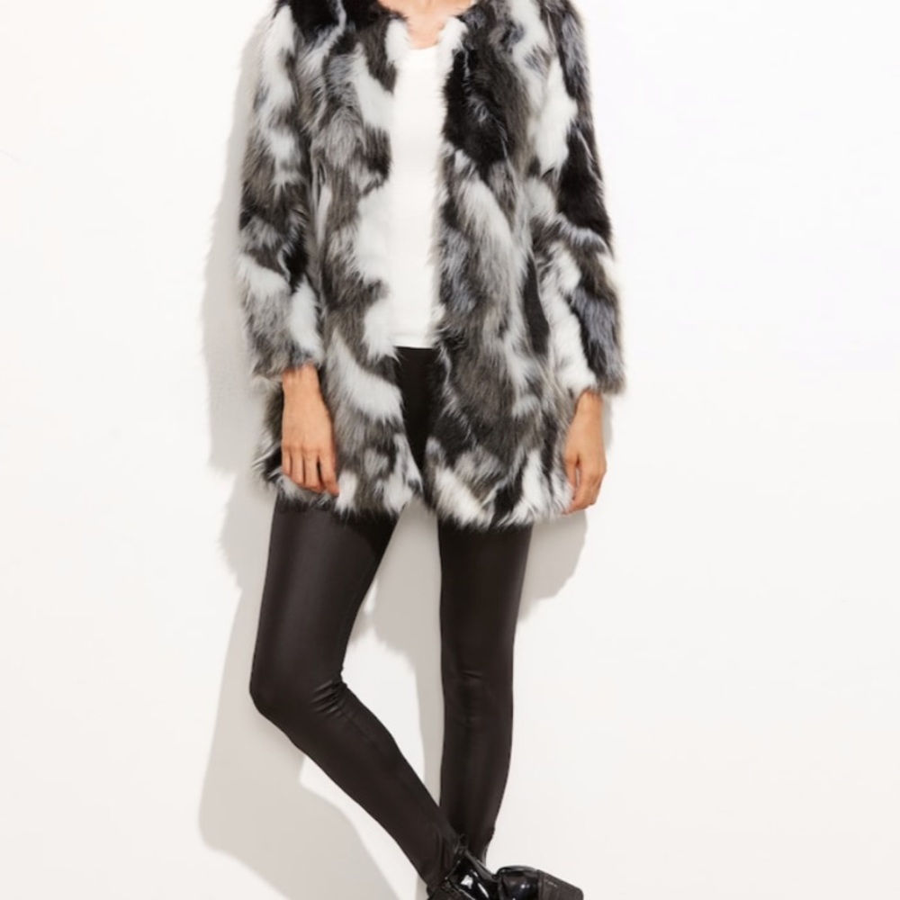 Stunning “Dalmatian” fuzzy jacket.
